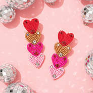 pink layered heart earrings with disco balls