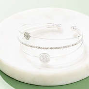 rhinestone bangle on marble dish