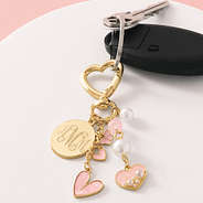 gold monogrammed bag charm keychain on keychain