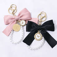 pink and black personalized bag charm keychains