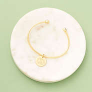 rhinestone cuff bangle on marble dish