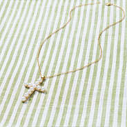 Pearl Cross Necklace nm on green stripes
