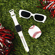 baseball hair clip on grass with apple watch band