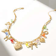 beaded charm necklace on white background