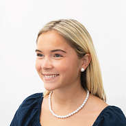 girl wearing pearl necklace nm 12mm earrings