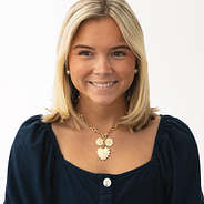 Girl Wearing Sun Heart Necklace