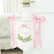 pink new baby banner on door