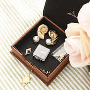 brown keepsake box with jewelry