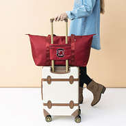 USC carry on weekender on suitcase