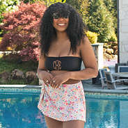 girl wearing monogrammed bandeau top without straps