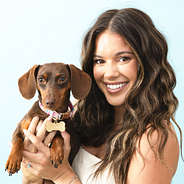 gold dog tag on dog with peyton