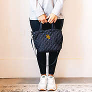 Girl holding Baylor Diamond Quilted Crossbody