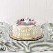 monogrammed cake tray with cake and berries