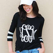 black tunic top with white hat and white monogram