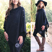 shimmery monogrammed luxe poncho with riding boots