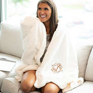 ivory sherpa blanket on couch