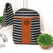 monogrammed striped shampoo bag on bathroom counter