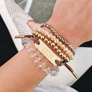 monogrammed brown and gold suede bracelet