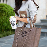 marble travel mug with purse and sweatshirt