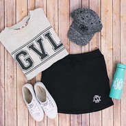 athleisure outfit with monogrammed skirt and monogrammed terry pullover