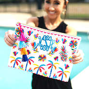 white cabana clutch with black romper