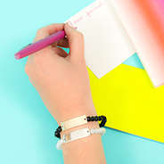 stacked black and white personalized bracelets