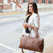 leather Weekender with gold monogram on front - 2025