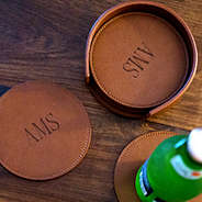 Personalized Leather Coasters on table
