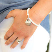 Monogrammed Pearl Bracelet with chambray shirt and white pants