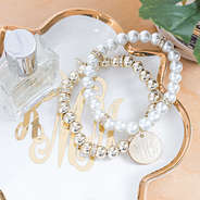 Monogrammed Pearl Bracelet Stack on top of a monogrammed jewlery tray