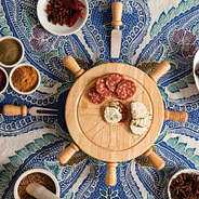 Top view of a Personalized Mariner's Cheese Board with meats and chesses