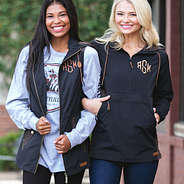 monogrammed utility vest and pullover rain jacket black brown colorblock