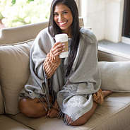 monogrammed tassel blanket and coffee cup