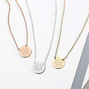 monogrammed disc necklaces in silver and gold and rose gold