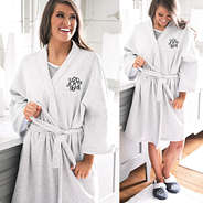 monogrammed sweatshirt robe on brunette in bathroom