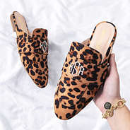 leopard spots slide on loafers in hands