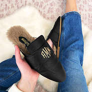 Fur lined black loafers with rug
