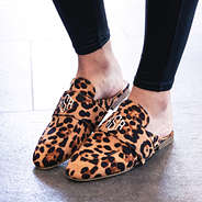 leopard spots slide on loafers on feet