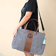 cute black and white striped monogrammed diaper bag with brown accents