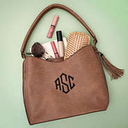 camel brown cheyenne purse flatlay