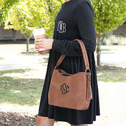 camel brown cheyenne purse on arm