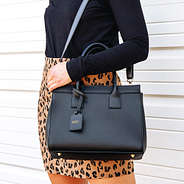 black sophie handbag on shoulder 2025