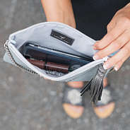 inside of silver glitter crossbody purse