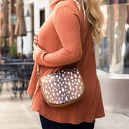 deer print flap shown on interchangeable crossbody