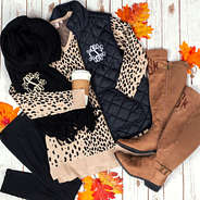 monogrammed leopard sweater tunic with monogrammed puffy vest, monogrammed riding boots and monogrammed oversized fringe scarf