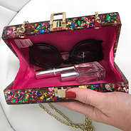 inside of monogrammed confetti box clutch