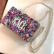 confetti box clutch on chair