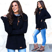 black sherpa turtleneck tunic with blue jeans and monogrammed duck boots