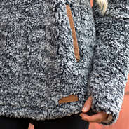 suede pocket detail, leather branding and thumbholes on heathered sherpa hoodie