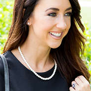 pearl earrings and pearl necklace set with black dress